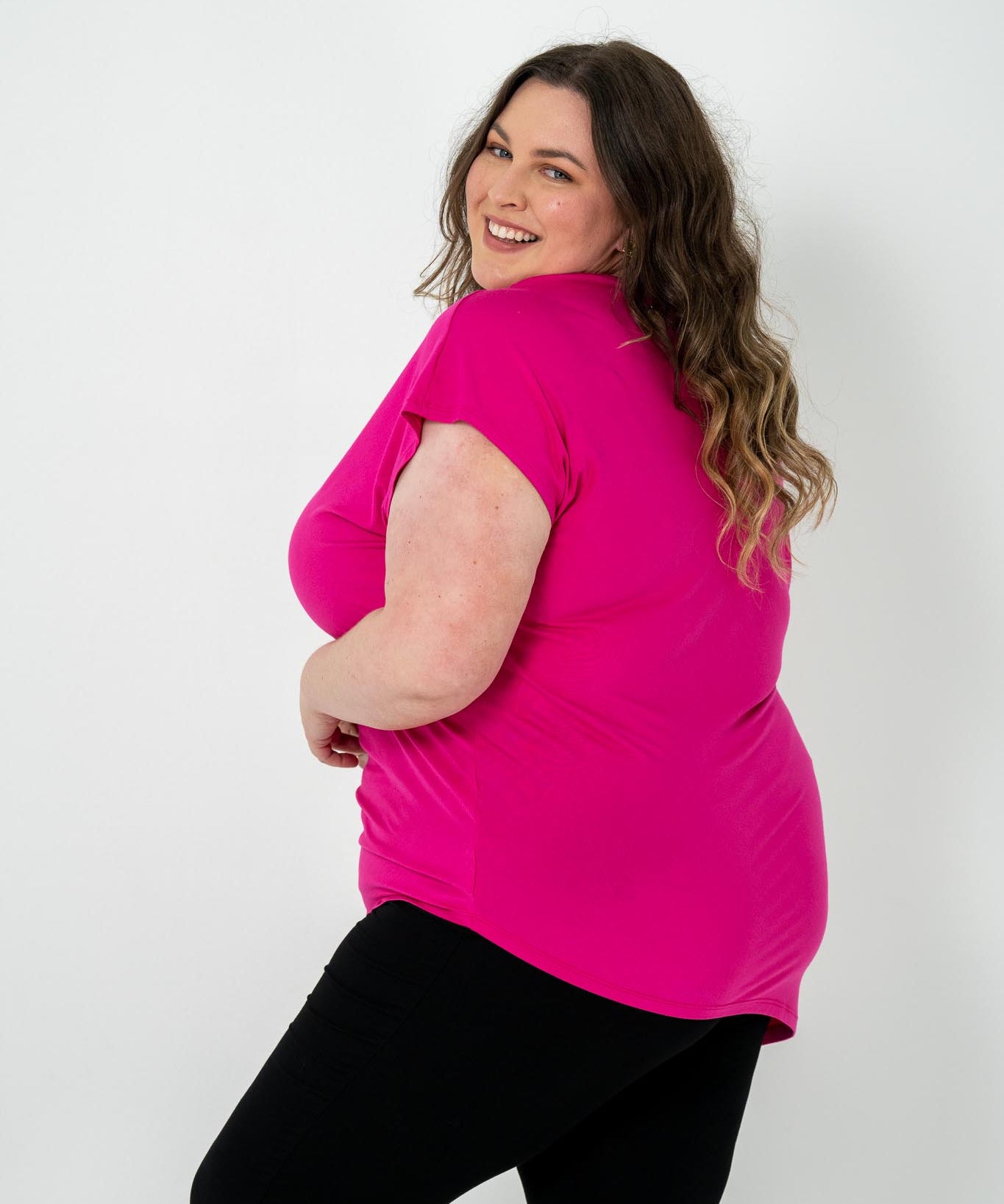 'Jazz' Asymmetric Top in plus size, featuring a flattering hem, ideal for casual or dressy occasions, pairs well with jeans, skirts, or leggings.