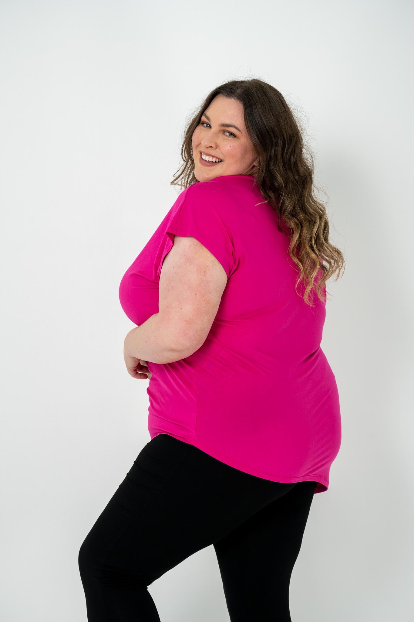 'Jazz' Asymmetric Top in plus size, featuring a flattering hem, ideal for casual or dressy occasions, pairs well with jeans, skirts, or leggings.