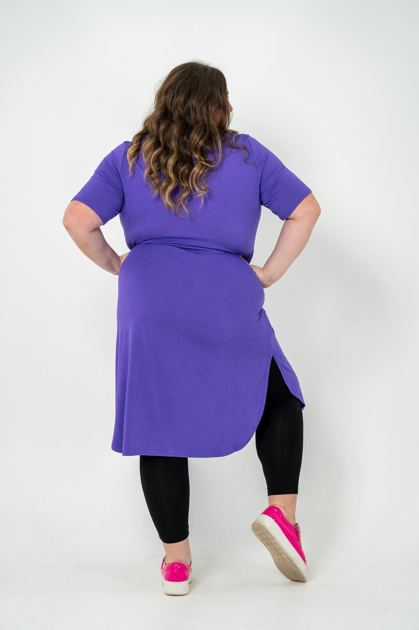 Plus size 'Alana' T-Shirt dress in purple, featuring short sleeves and lightweight material for comfort and versatility, perfect for pairing with an 'AVA' jacket or kimonos.