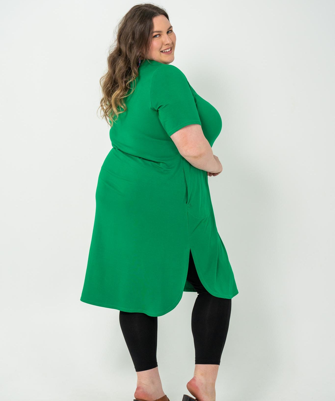 Plus size 'Alana' T-shirt dress in green, featuring a lightweight and breathable design for everyday comfort and classic style.