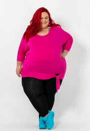 Plus-size Bat Wing Top with a sleek color, batwing cut, and adjustable side ties for a customized fit.