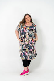 Plus size 'ALANA' T-Shirt dress in vintage poster print, featuring lightweight fabric for comfort and style, perfect for everyday wear.