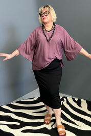 Plus-size mulberry top with a stylish, relaxed fit.