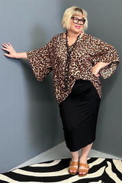 Plus-size leopard print top with a stylish, relaxed fit.