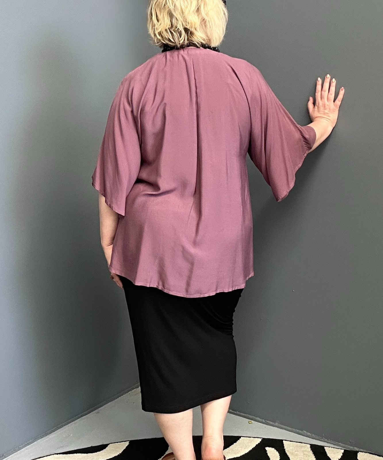Plus-size mulberry top with a stylish, relaxed fit.