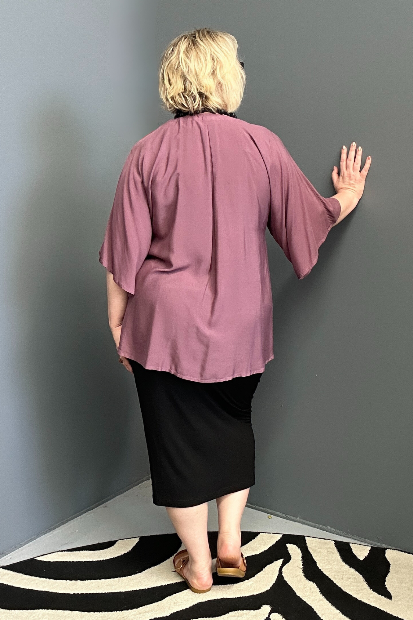 Plus-size mulberry top with a stylish, relaxed fit.
