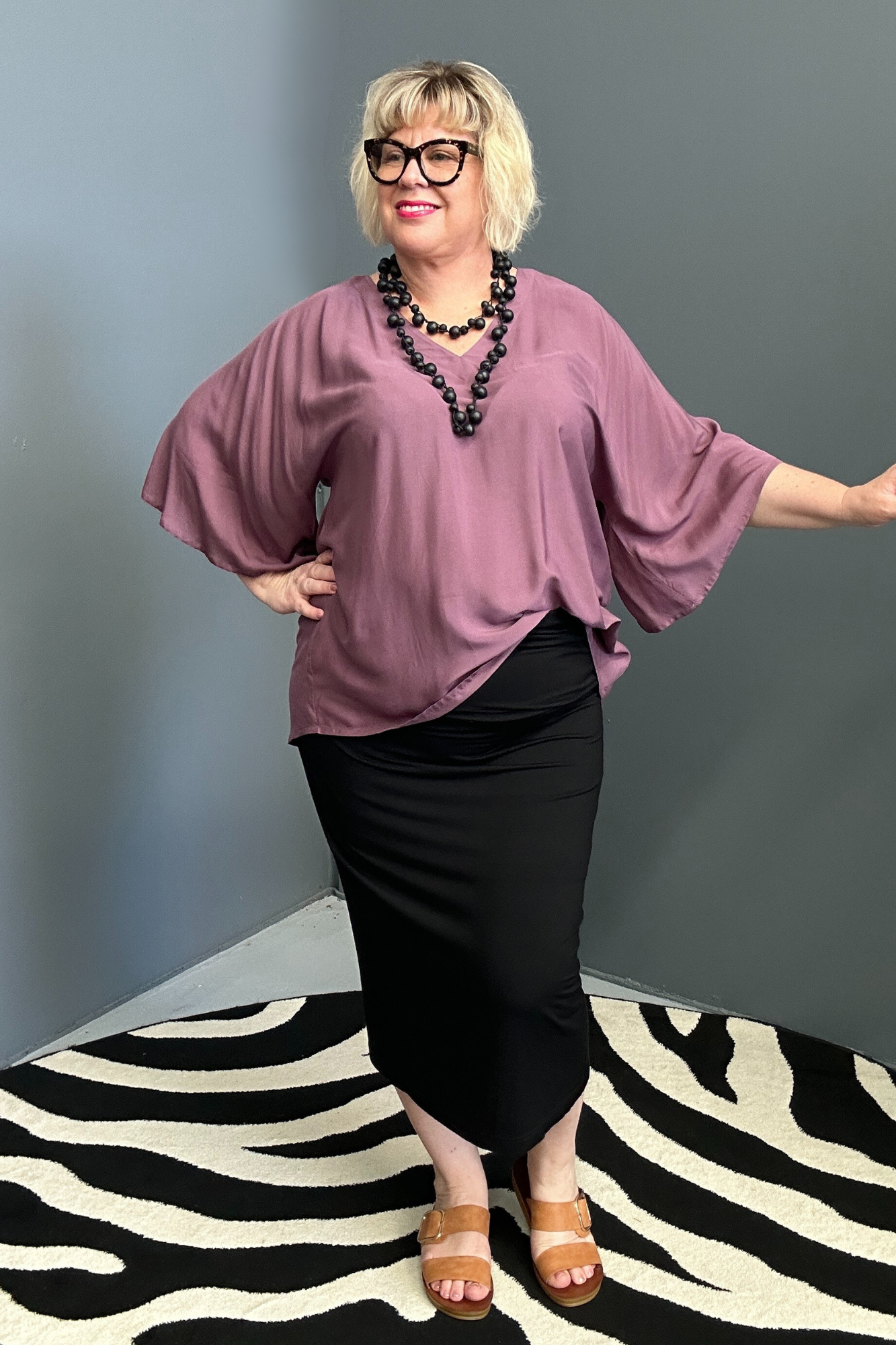 Plus-size mulberry top with a stylish, relaxed fit.
