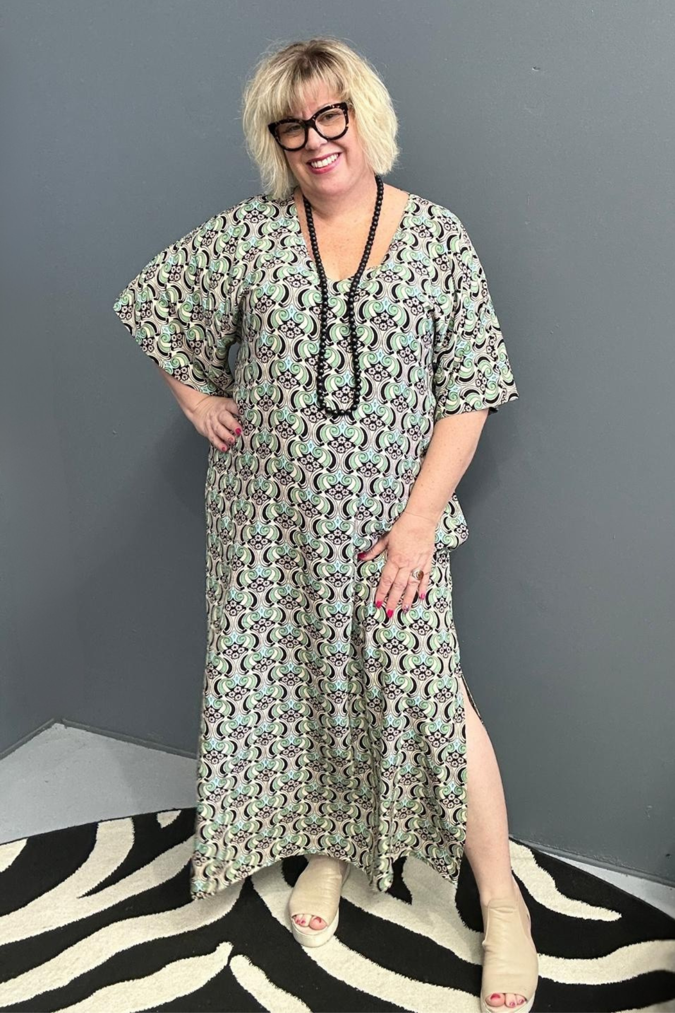 Plus-size mint swirl dress with a flattering fit and graceful flow.