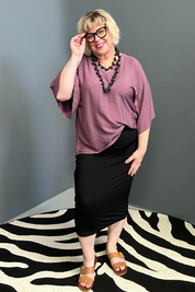 Plus-size mulberry top with a stylish, relaxed fit.