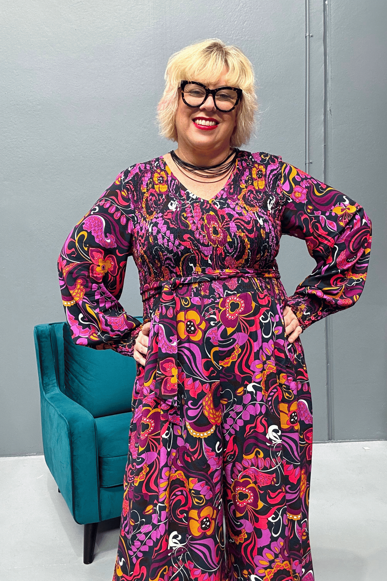 Plus-size wide-leg floral pants with a watercolor design, featuring a flattering high waist and made from cool rayon for year-round wear.