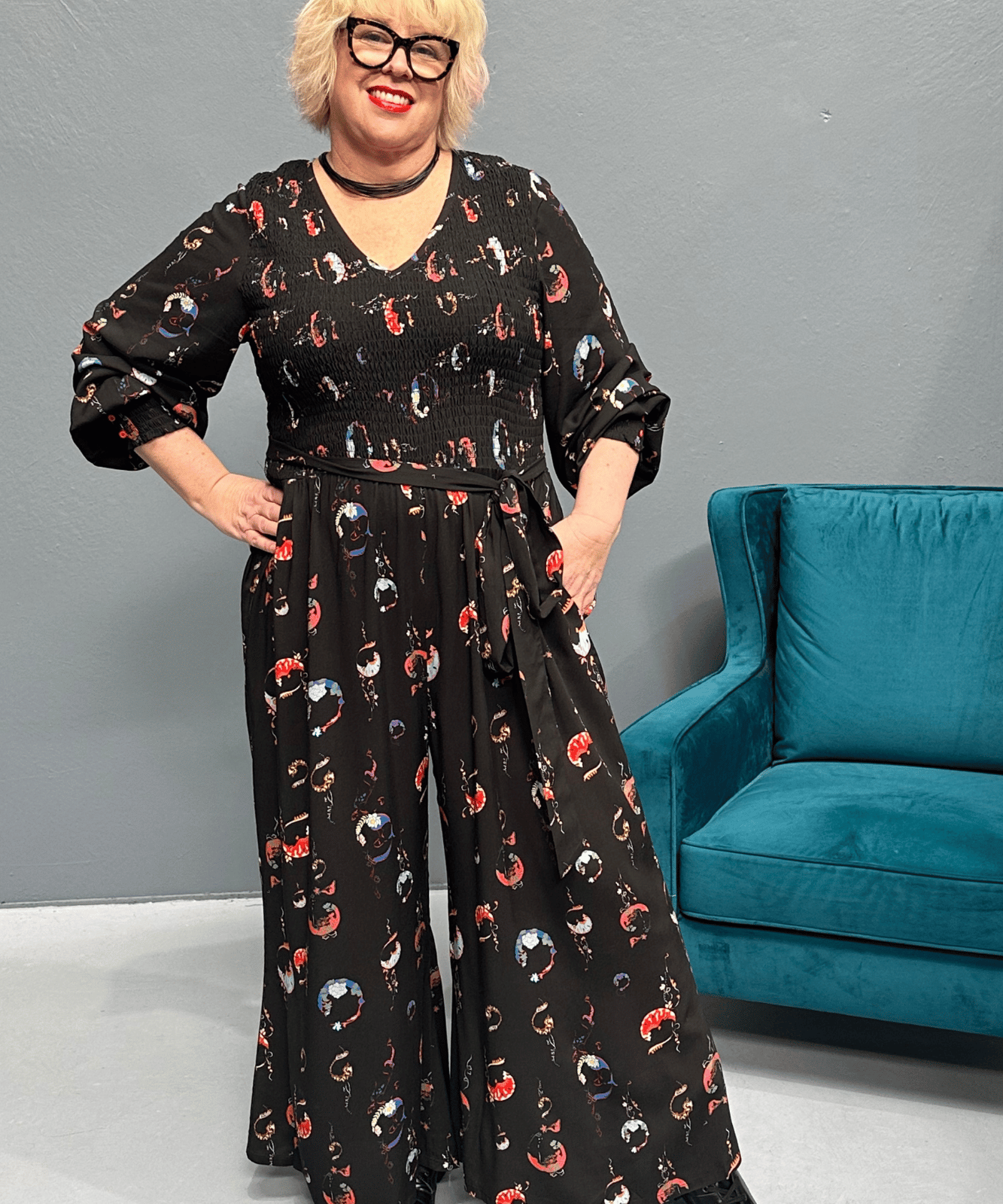 Plus-size FEARLESS jumpsuit with a dreamy moon print.