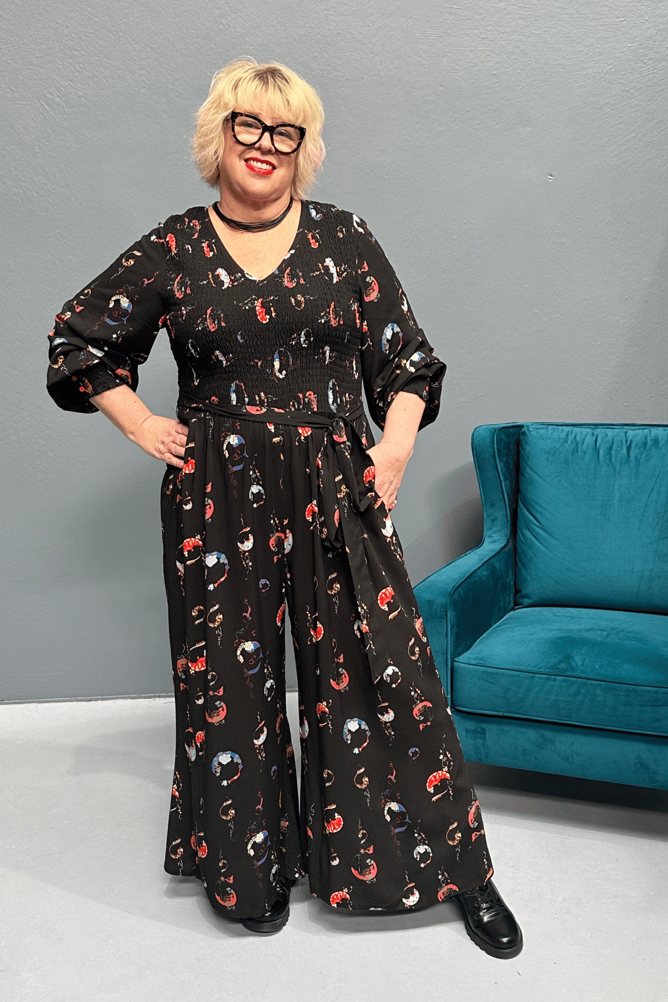 Plus-size FEARLESS jumpsuit with a dreamy moon print.