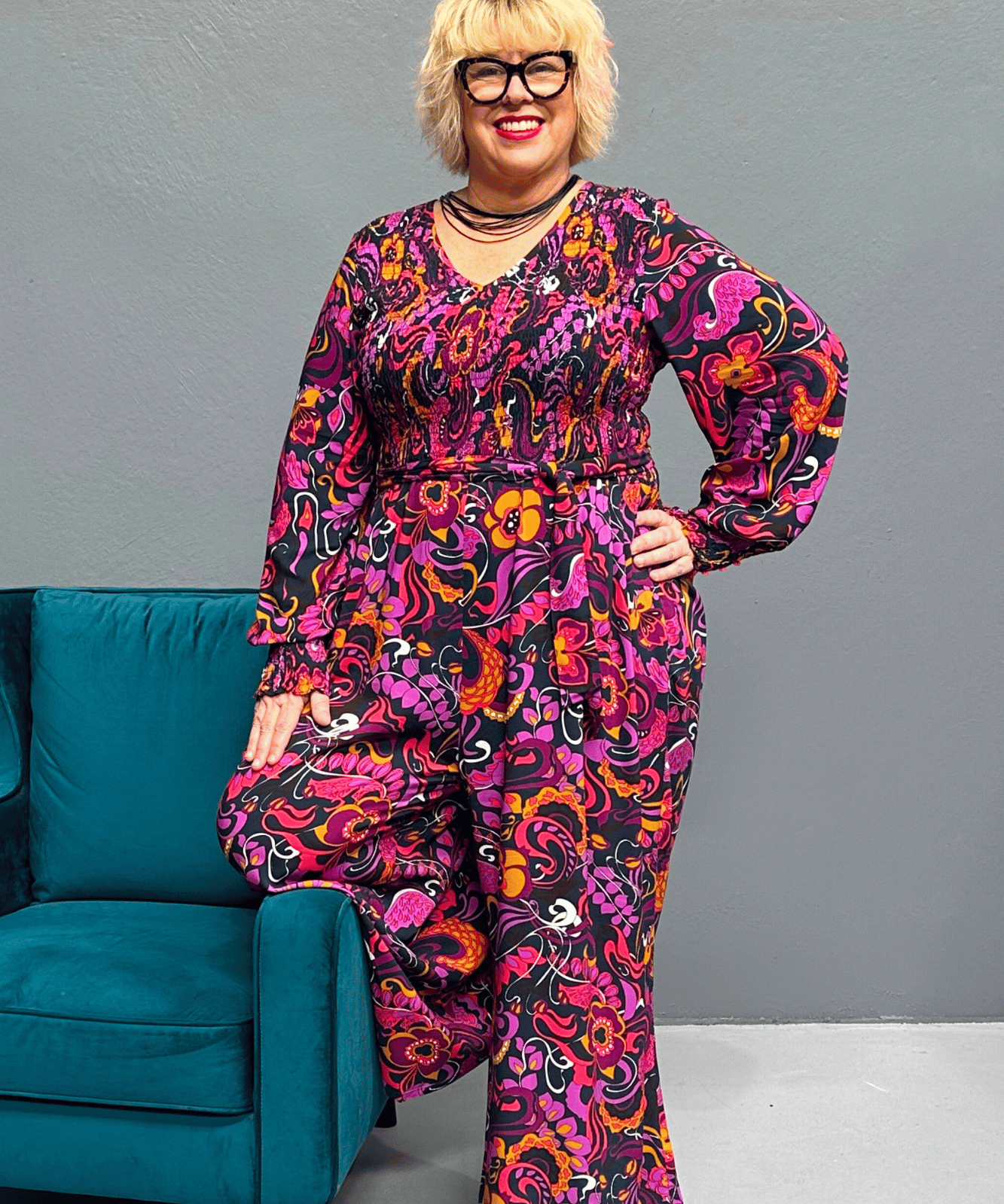 Plus-size wide-leg floral pants with a watercolor design, featuring a flattering high waist and made from cool rayon for year-round wear.