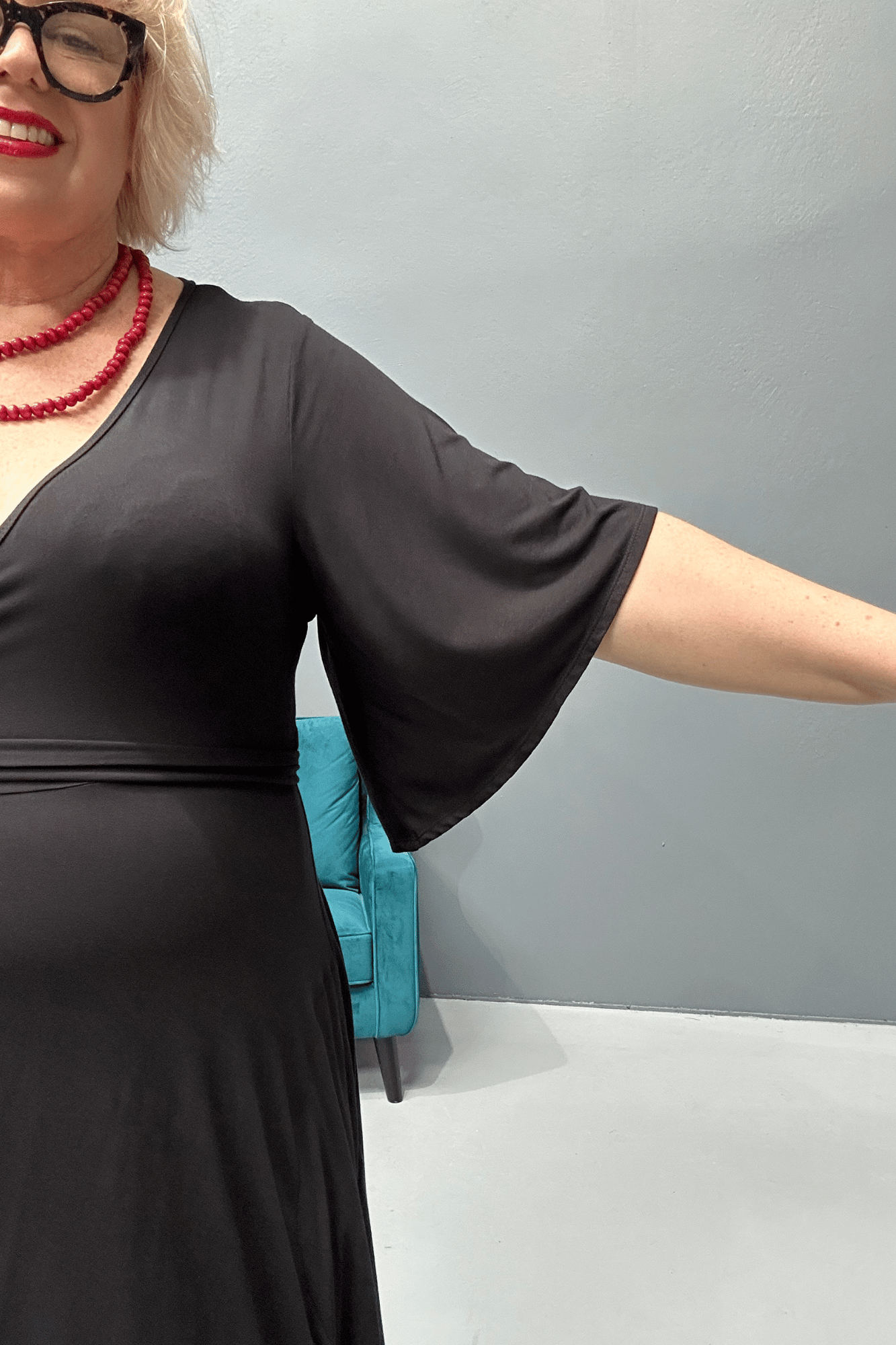  'Goddess' bamboo jersey wrap dress for plus-size women, designed for curvy bodies with a flattering drape.