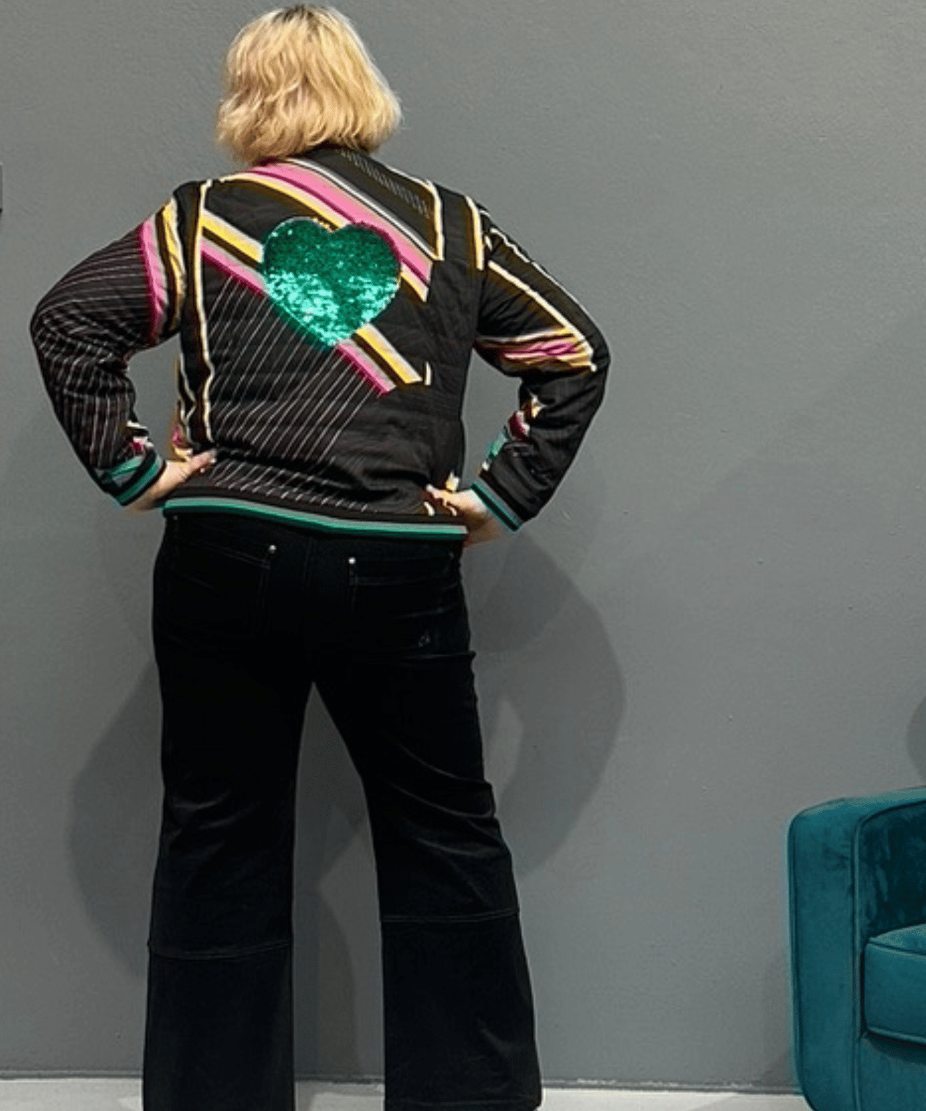 Retro 'HEART' bomber jacket with emerald sequinned heart, bamboo lining, and showerproof fabric, perfect for plus size women’s fashion.