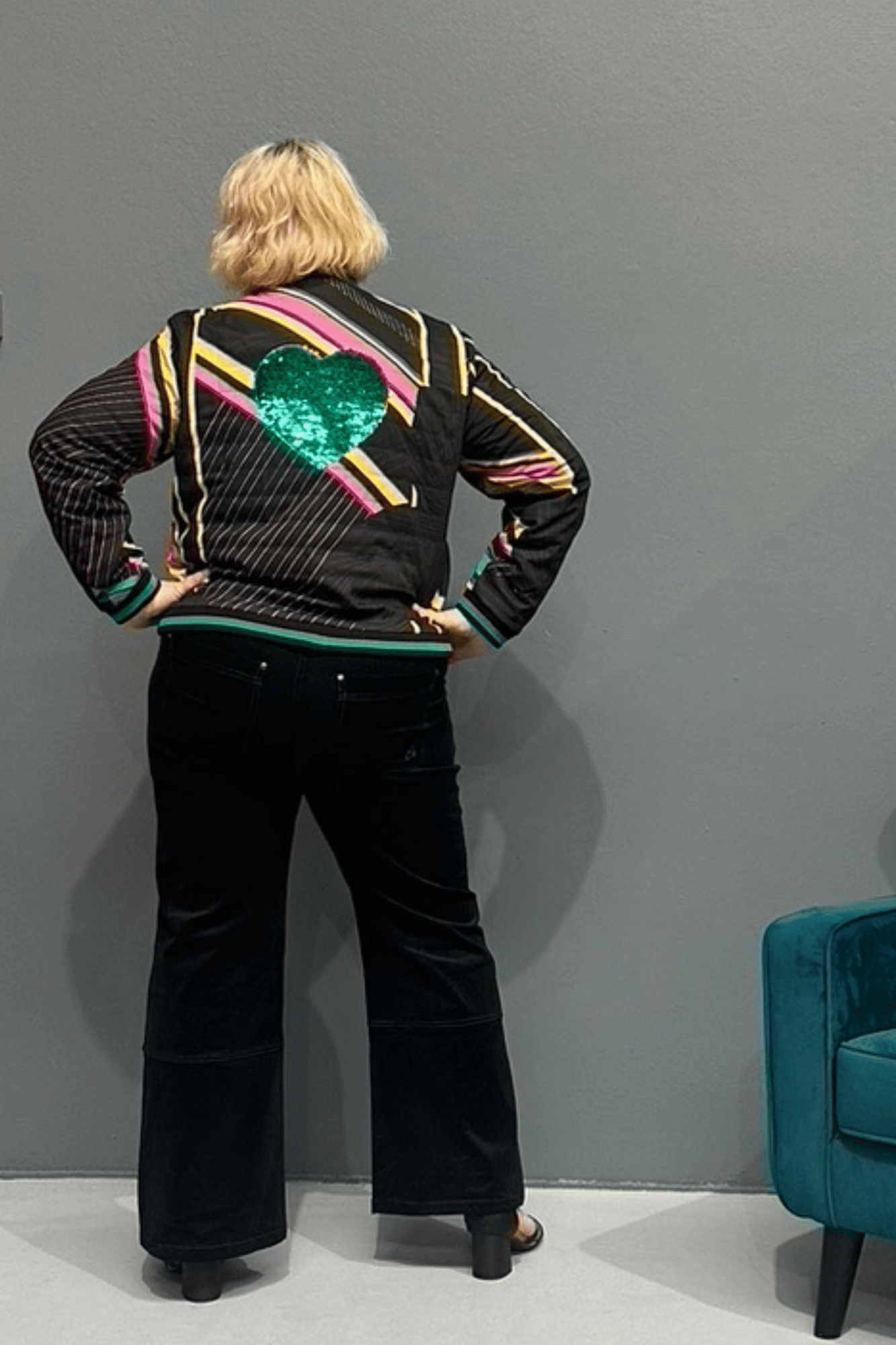 Retro 'HEART' bomber jacket with emerald sequinned heart, bamboo lining, and showerproof fabric, perfect for plus size women’s fashion.