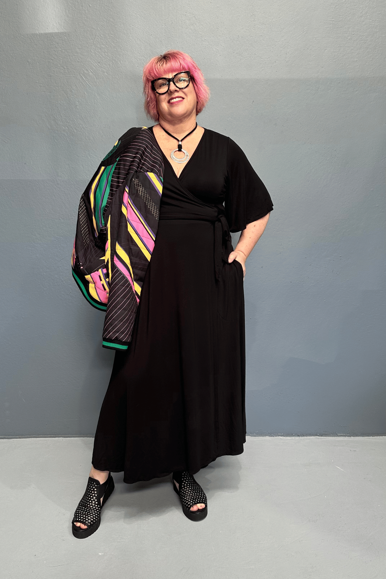 Retro 'HEART' bomber jacket with emerald sequinned heart, bamboo lining, and showerproof fabric, perfect for plus size women’s fashion.