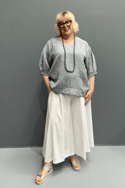 'Holly' plus size linen top with a high-low hem, balloon sleeves, and dropped armholes for comfort and airflow.