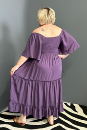 Plus-size grape dress with a soft, flowy fit.