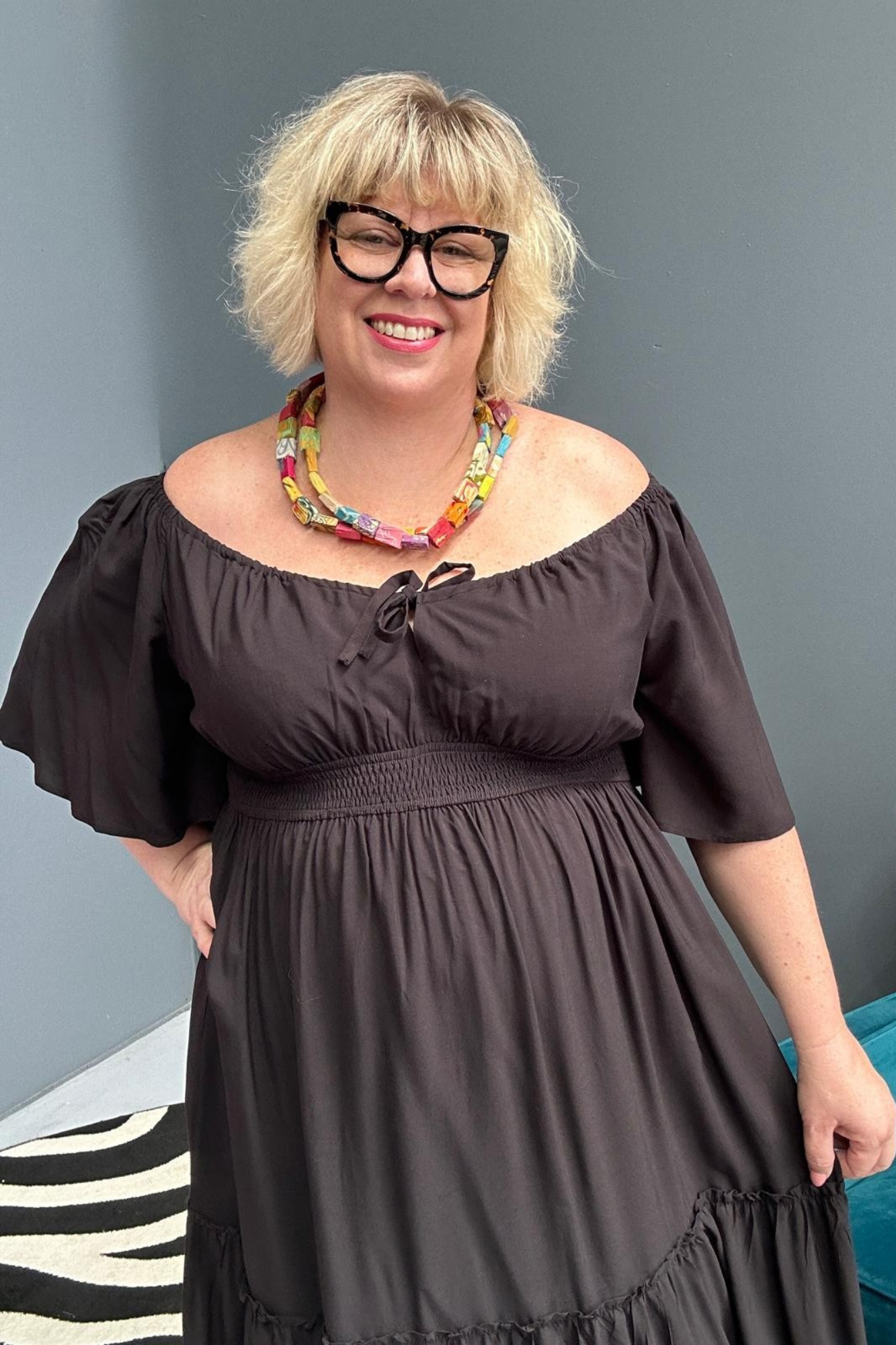 Plus-size black dress with a soft, flowy fit.