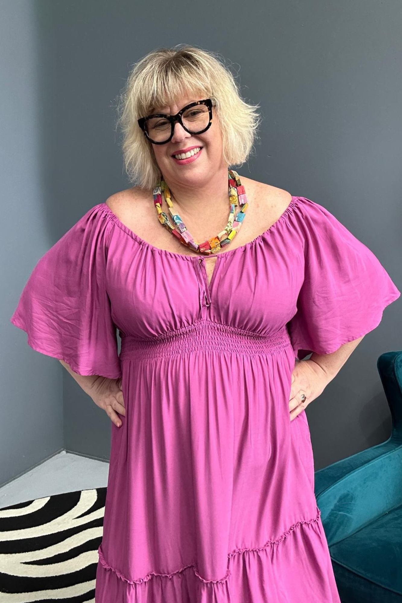 Plus-size fuchsia dress with a soft, flowy fit.