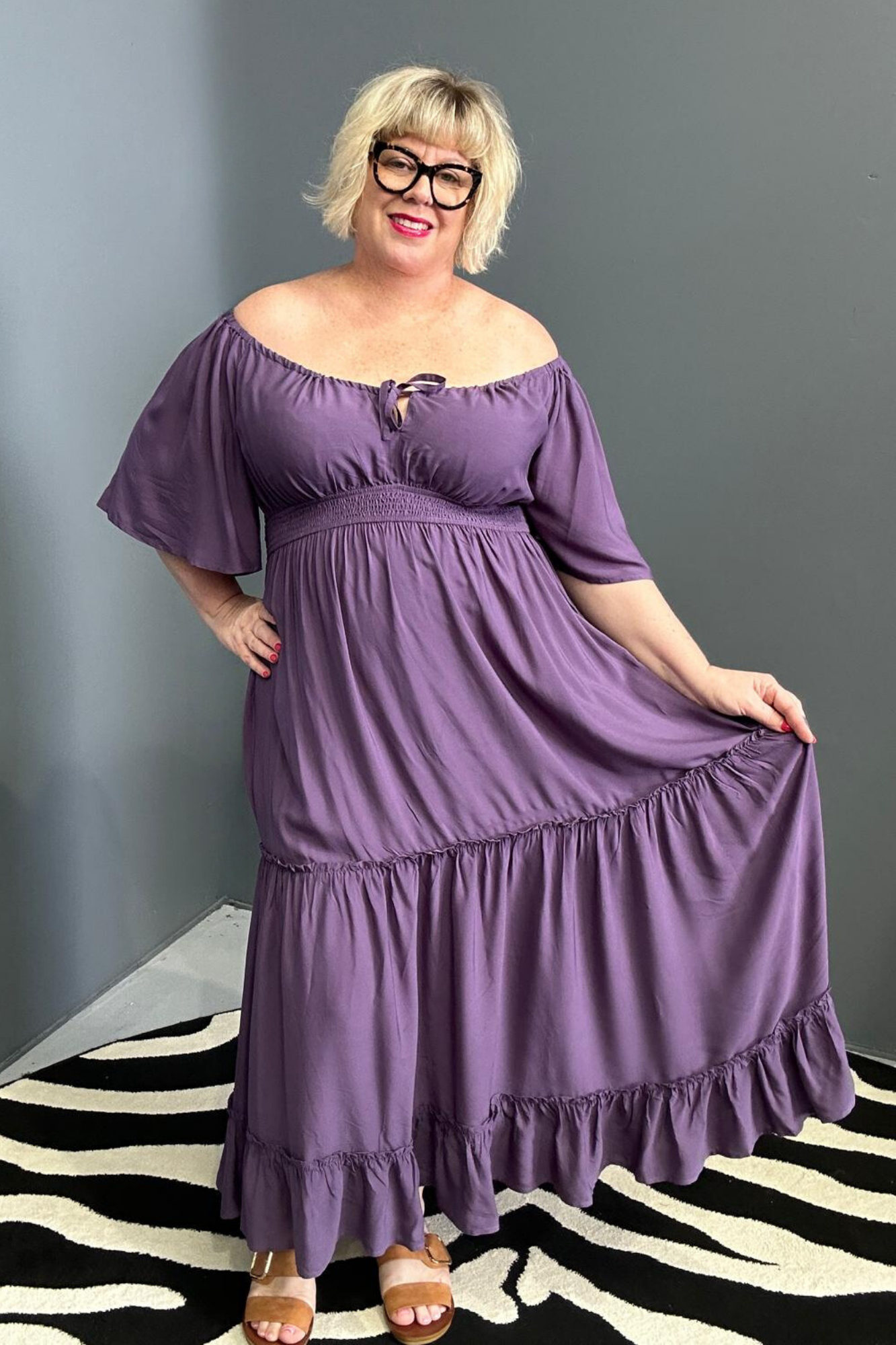 Plus-size grape dress with a soft, flowy fit.