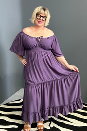 Plus-size grape dress with a soft, flowy fit.