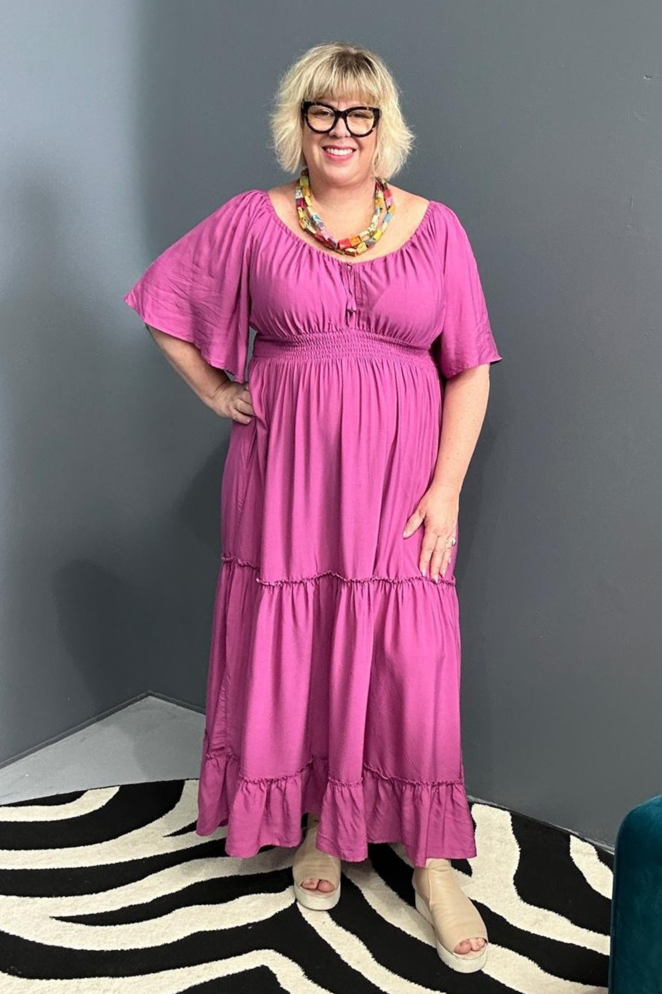 Plus-size fuchsia dress with a soft, flowy fit.