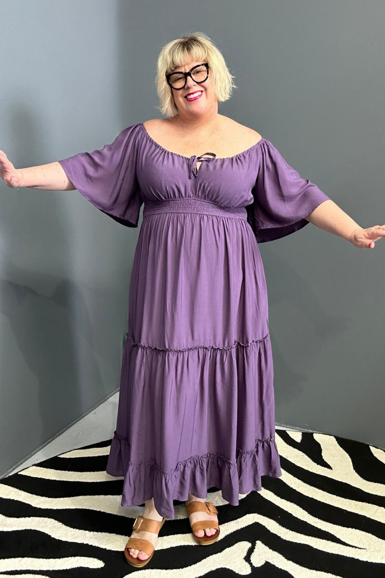 Plus-size grape dress with a soft, flowy fit.
