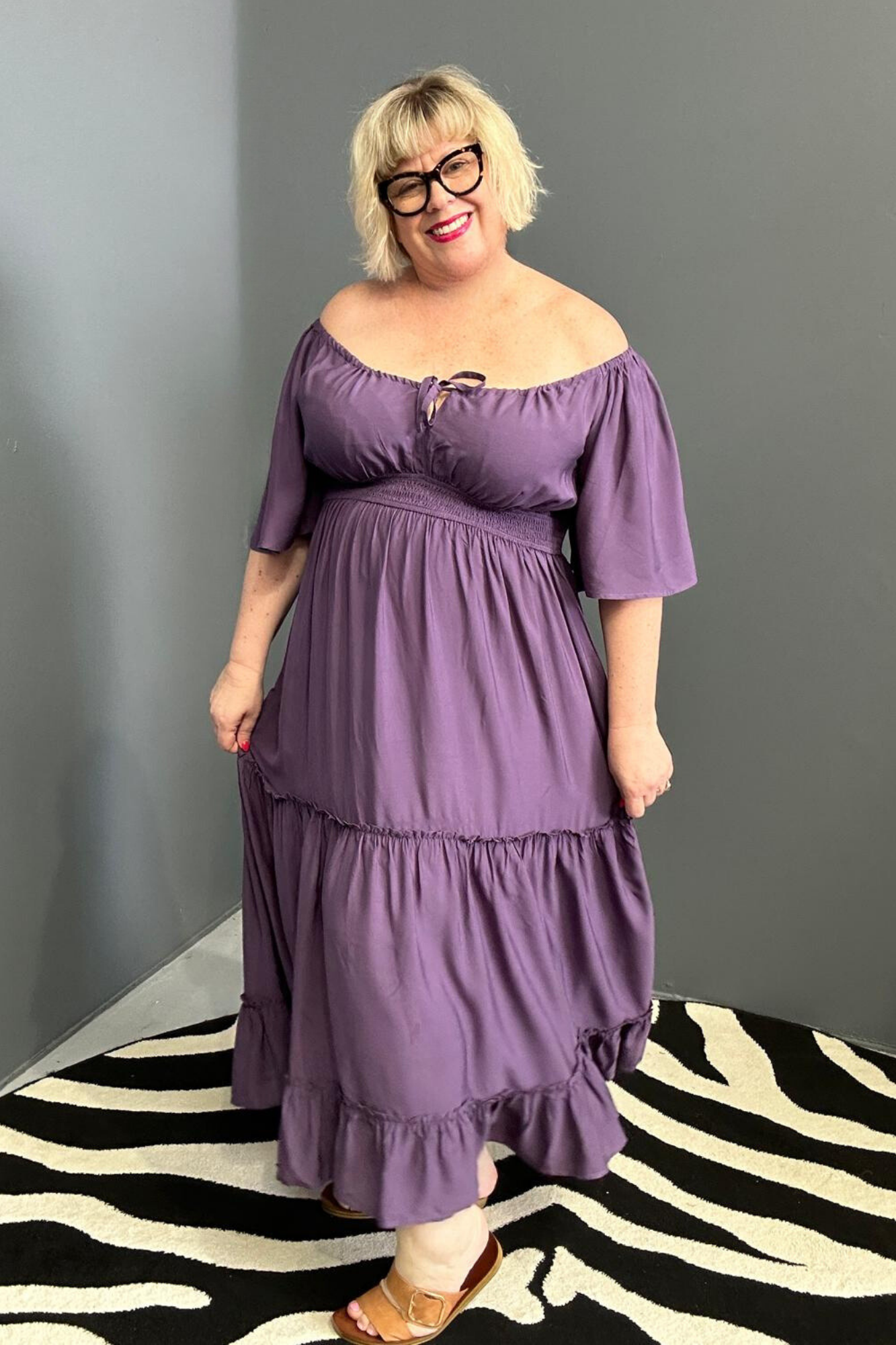 Plus-size grape dress with a soft, flowy fit.