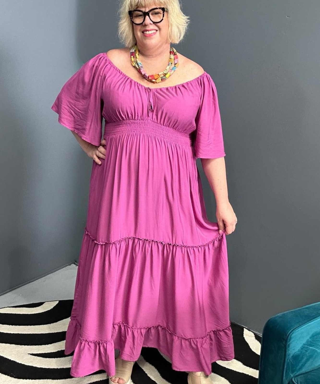 Plus-size fuchsia dress with a soft, flowy fit.
