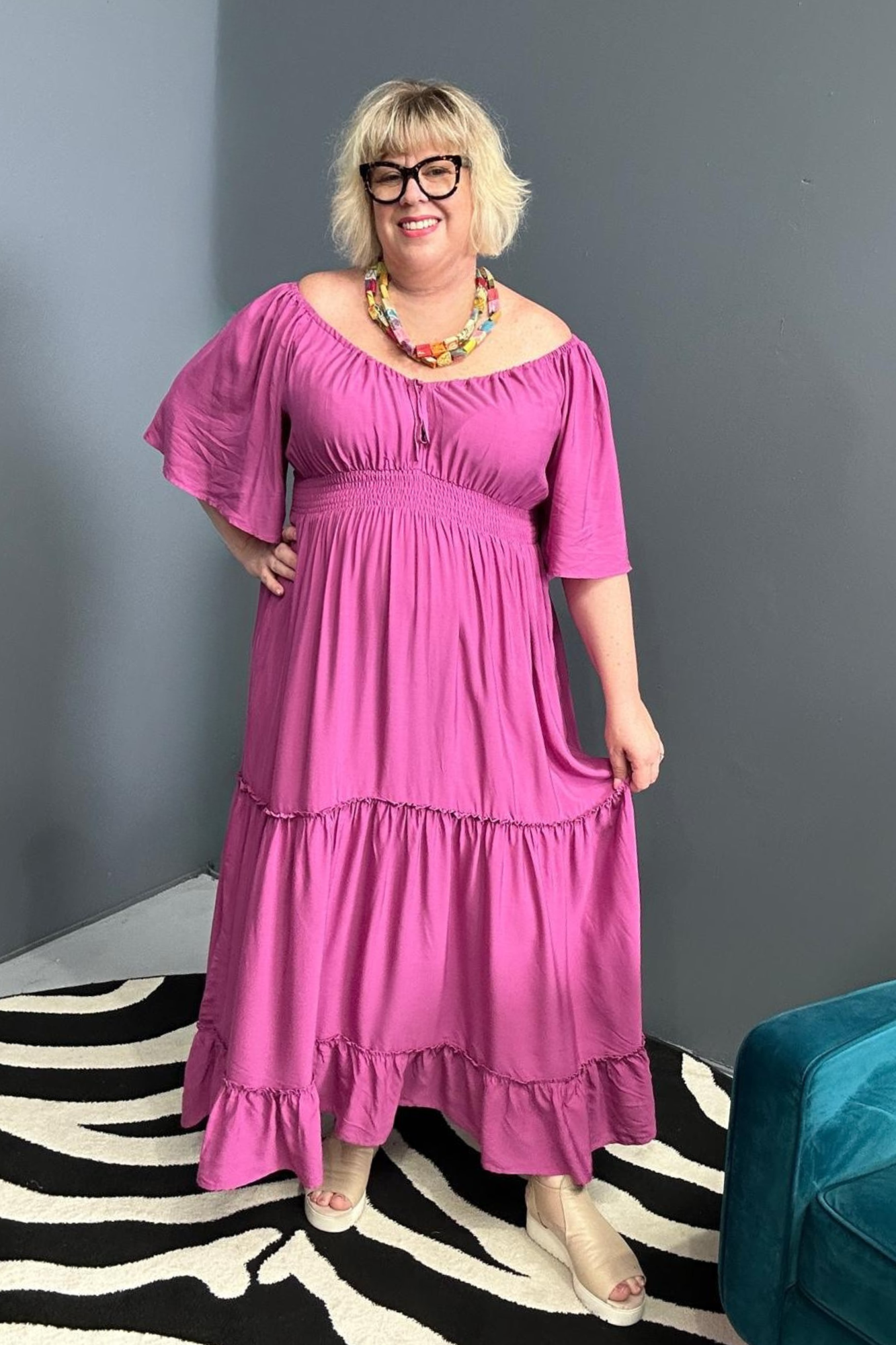 Plus-size fuchsia dress with a soft, flowy fit.