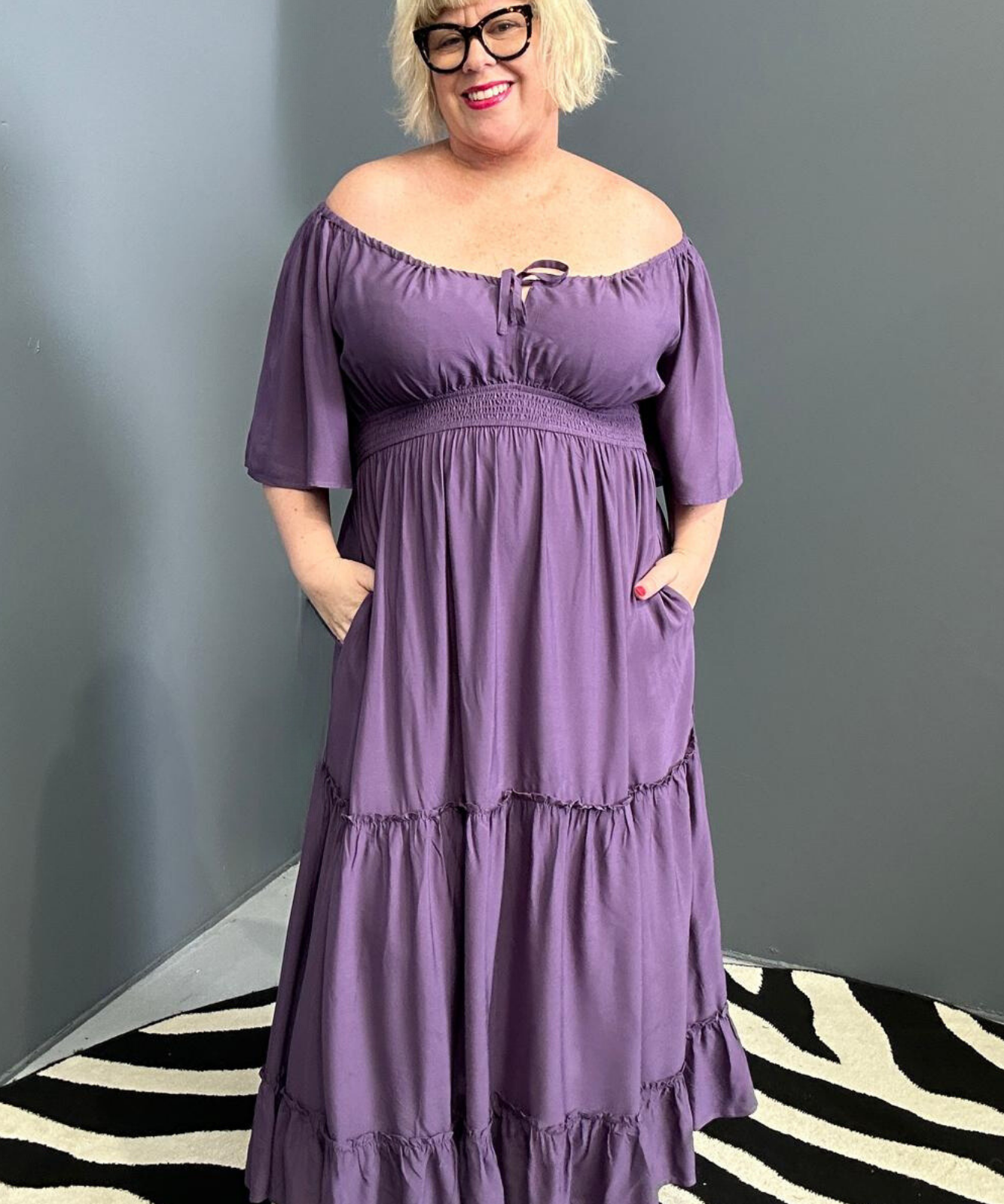 Plus-size grape dress with a soft, flowy fit.