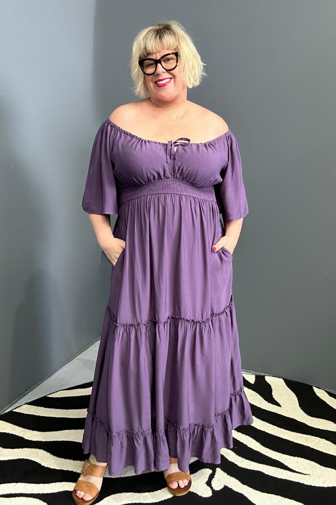 Plus-size grape dress with a soft, flowy fit.