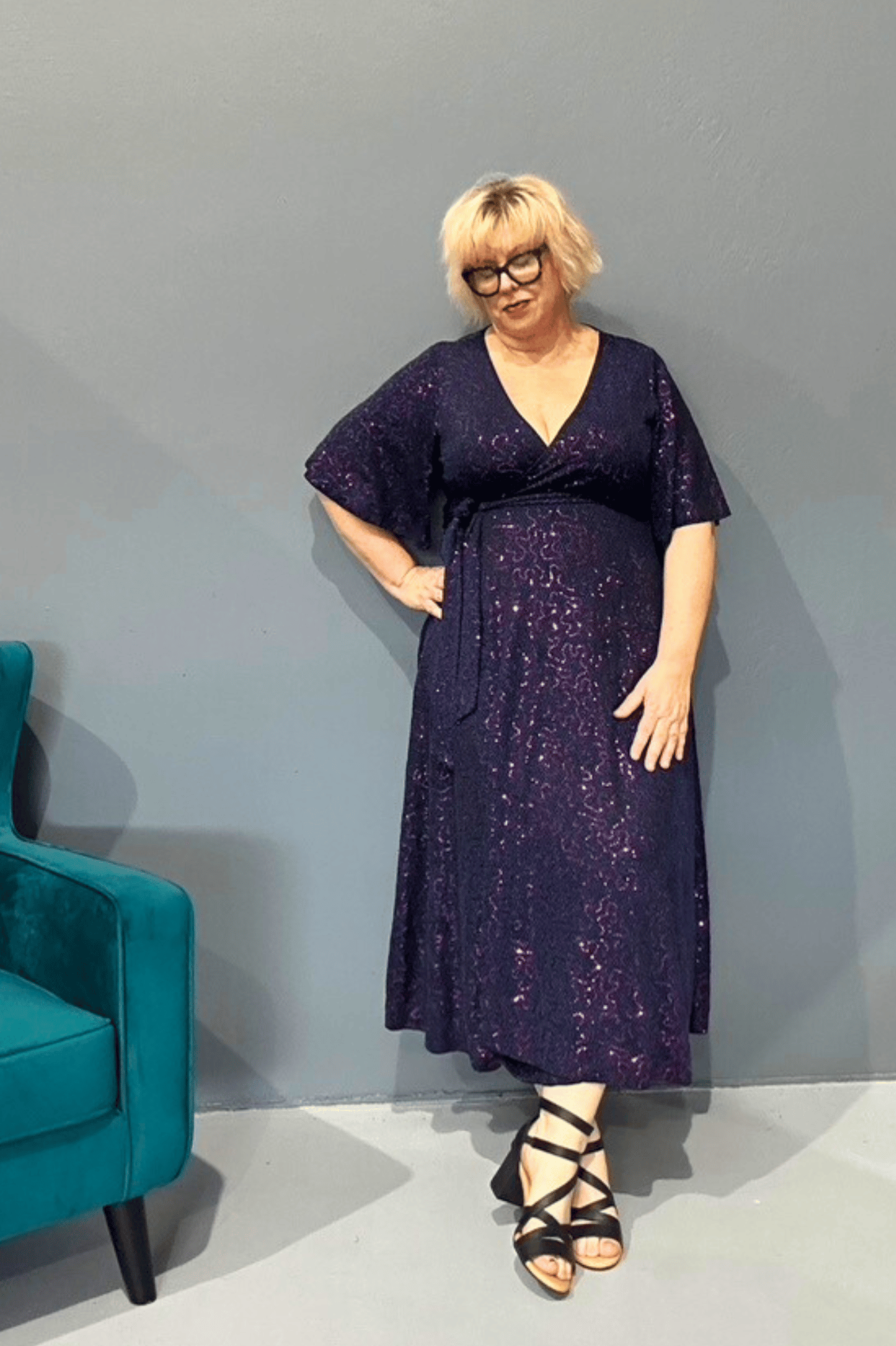 Marilyn wrap dress with cobalt blue metallic thread and pink sequins, designed to flatter all body types.