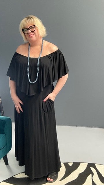Plus-size black bamboo maxi dress with frill details, flowy fit.