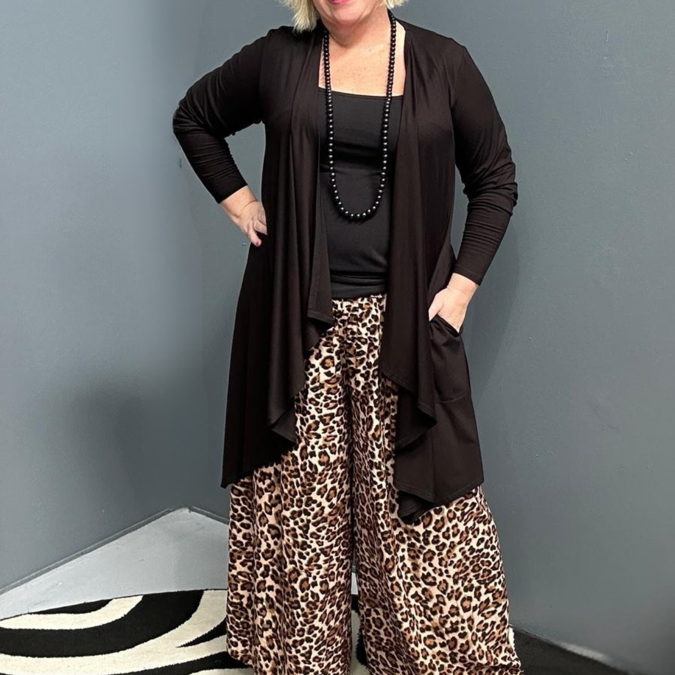 Plus-size black bamboo cardigan with a soft, flowy drape.
