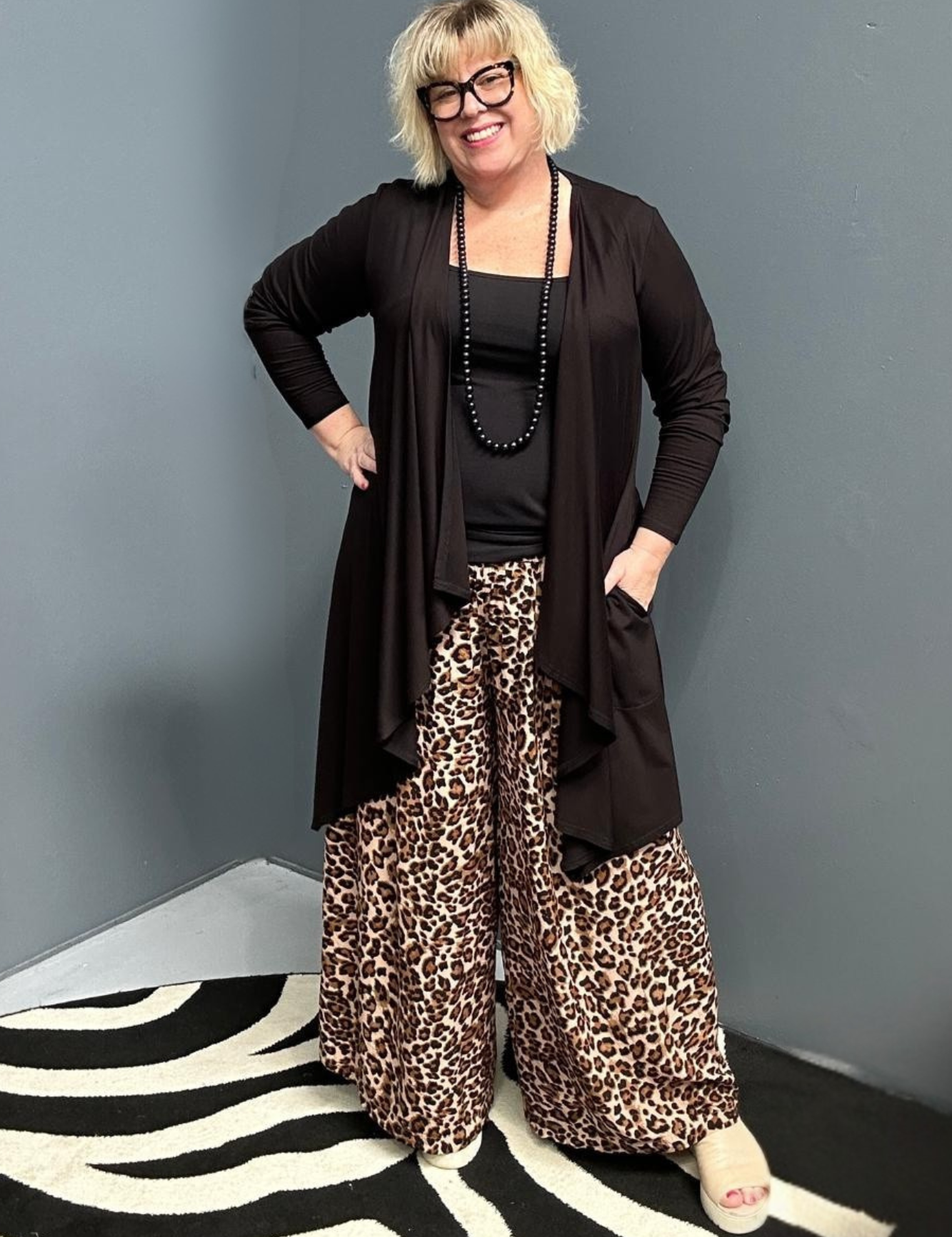 Plus-size black bamboo cardigan with a soft, flowy drape.
