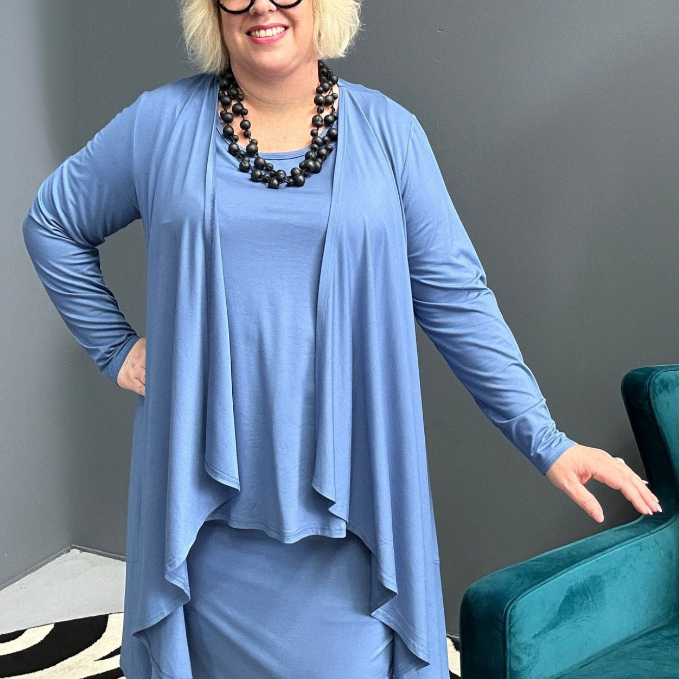 Plus-size French blue bamboo cardigan with a soft, flowy drape.