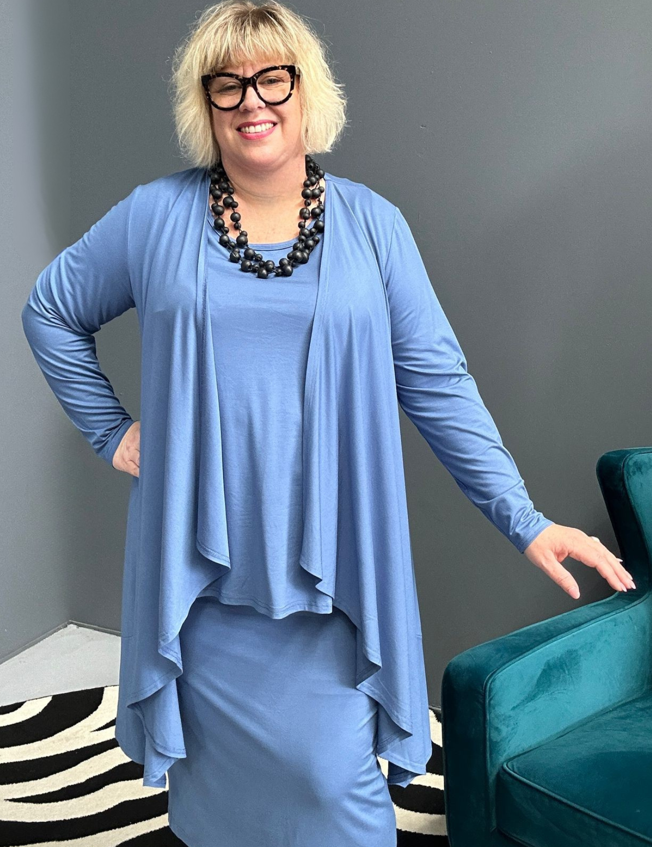 Plus-size French blue bamboo cardigan with a soft, flowy drape.