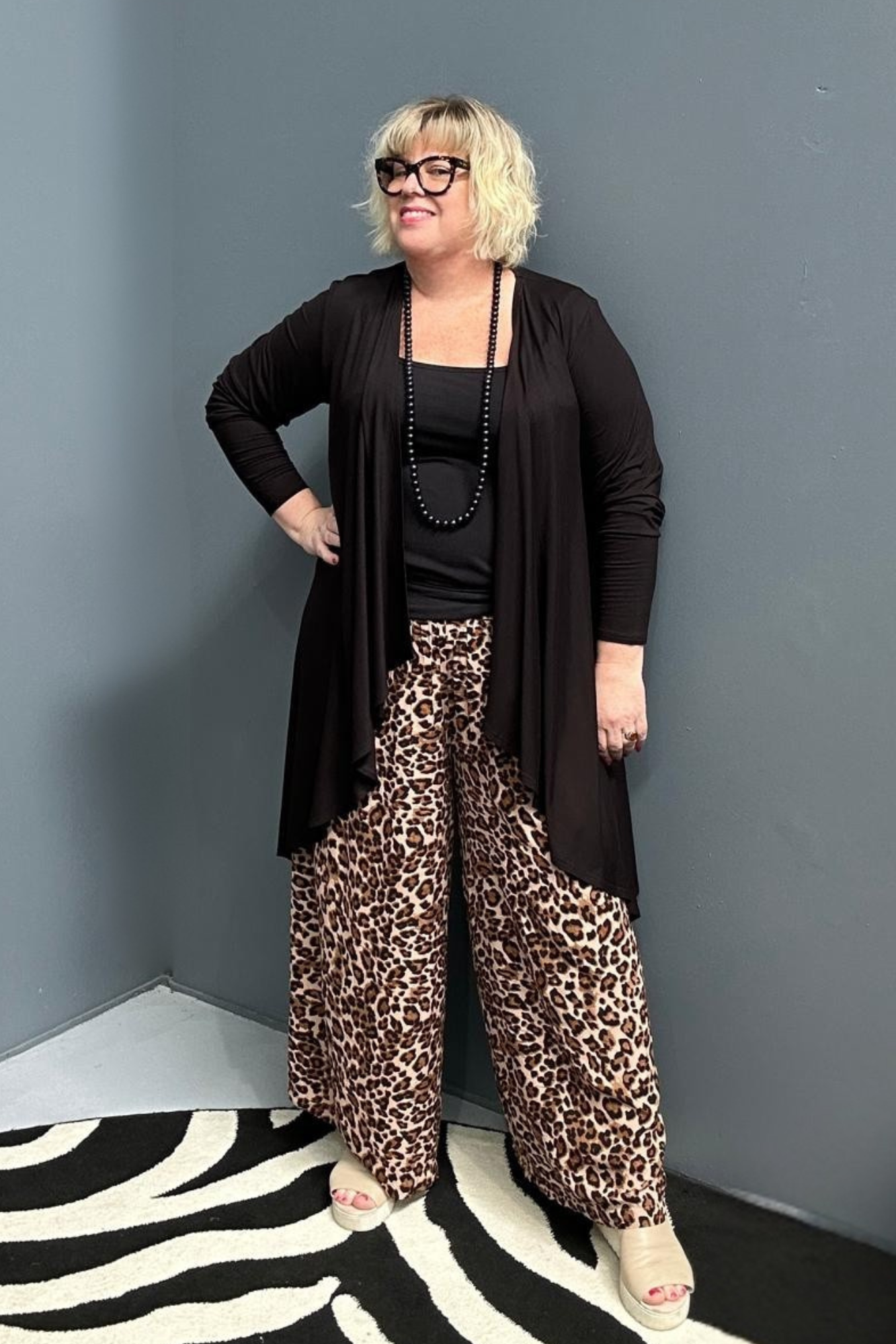 Plus-size black bamboo cardigan with a soft, flowy drape.
