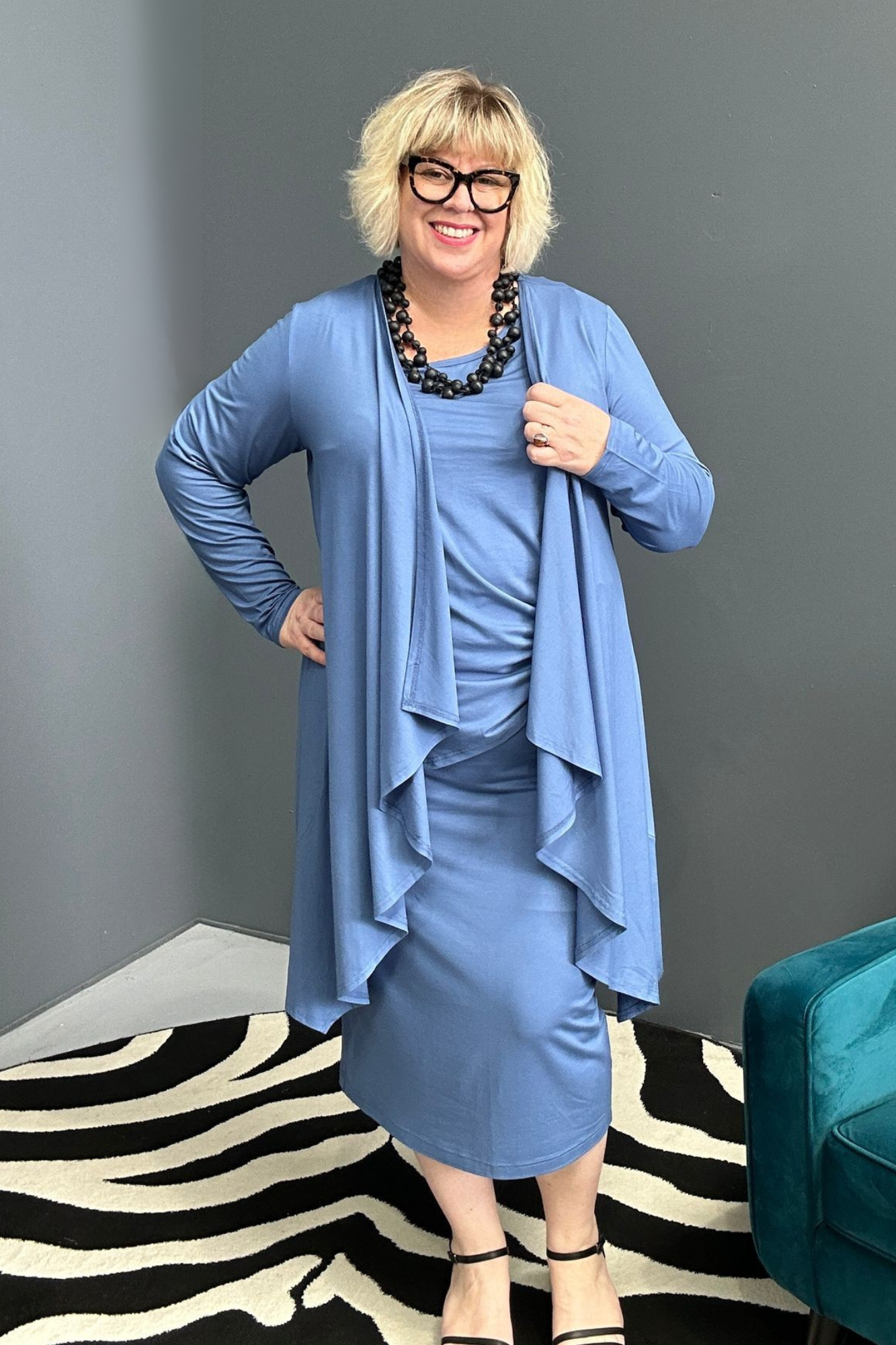 Plus-size French blue bamboo cardigan with a soft, flowy drape.
