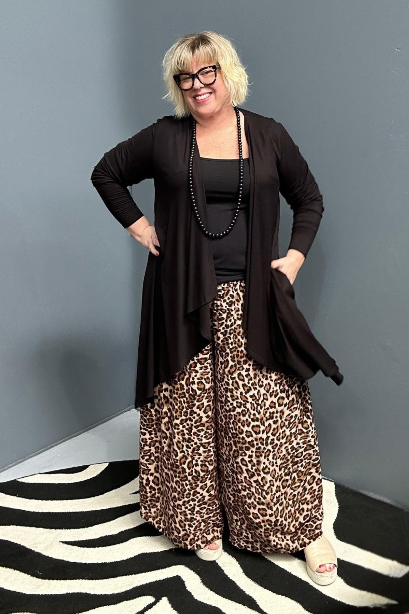 Plus-size black bamboo cardigan with a soft, flowy drape.