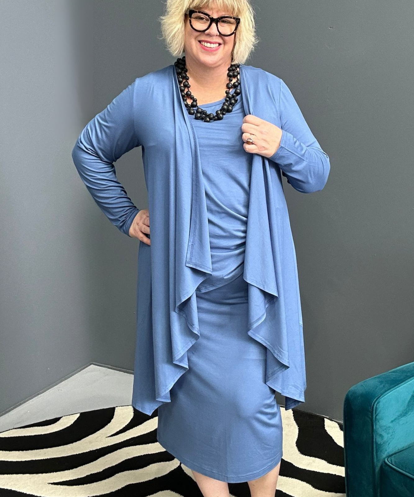 Plus-size French blue bamboo cardigan with a soft, flowy drape.