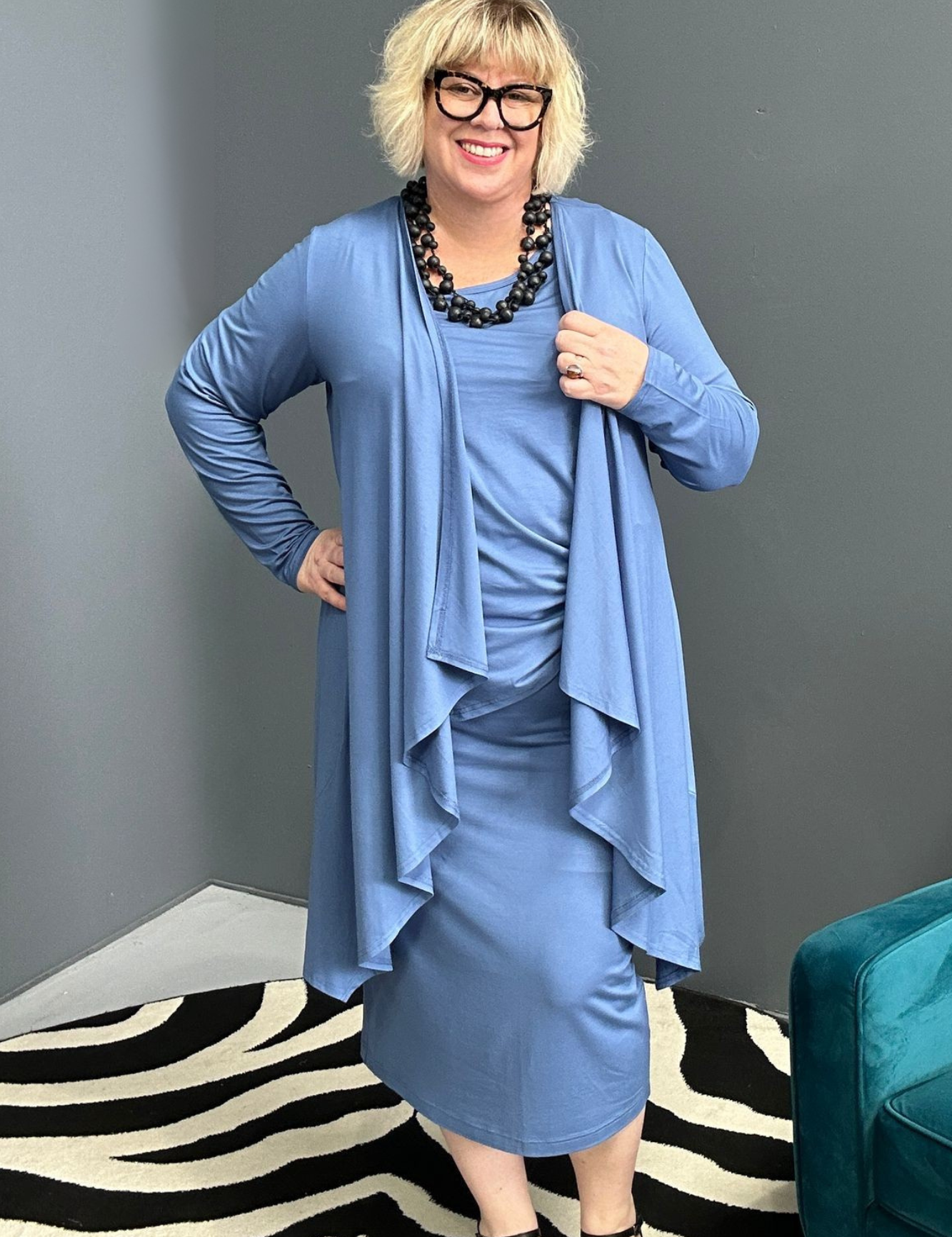 Plus-size French blue bamboo cardigan with a soft, flowy drape.