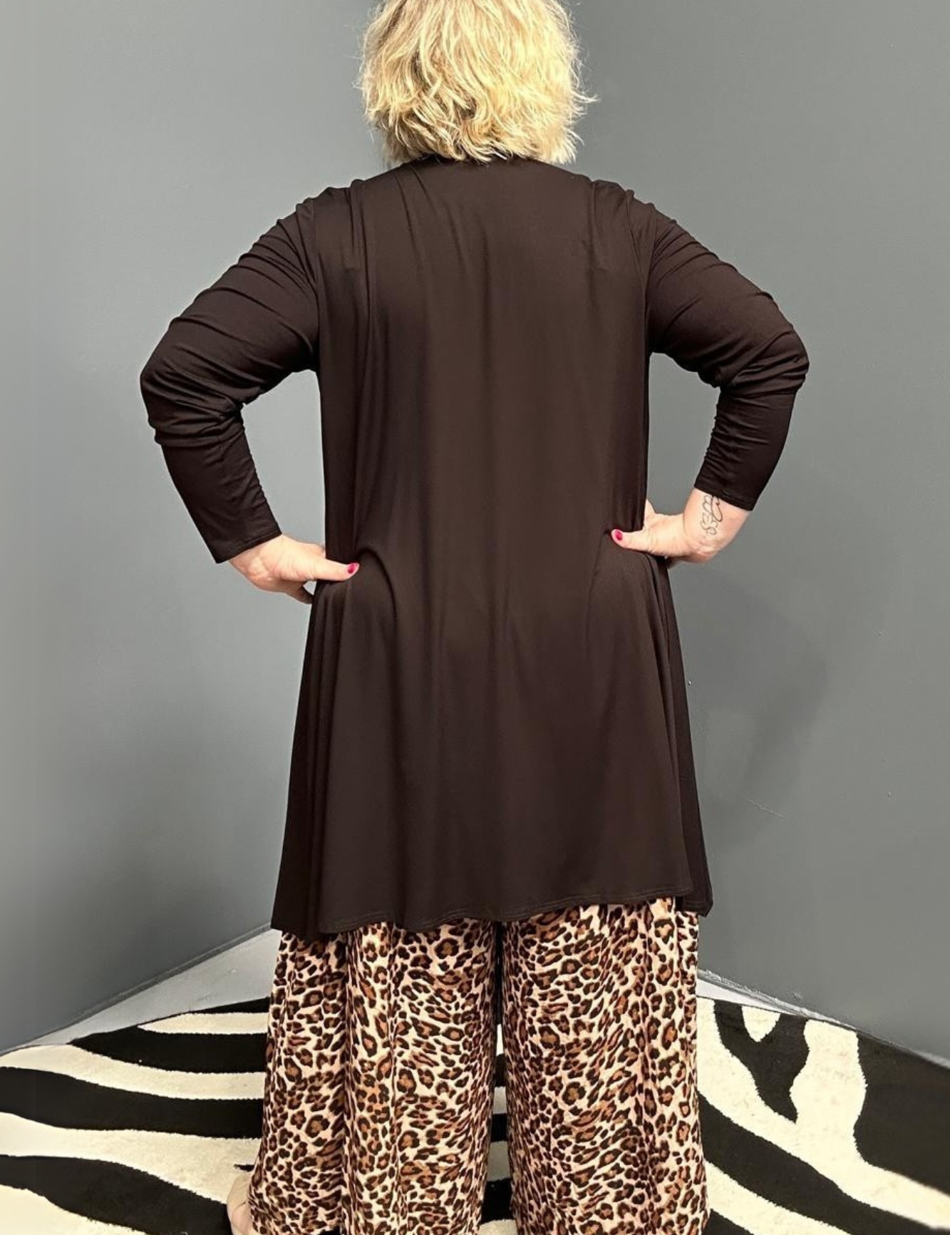 Plus-size black bamboo cardigan with a soft, flowy drape.