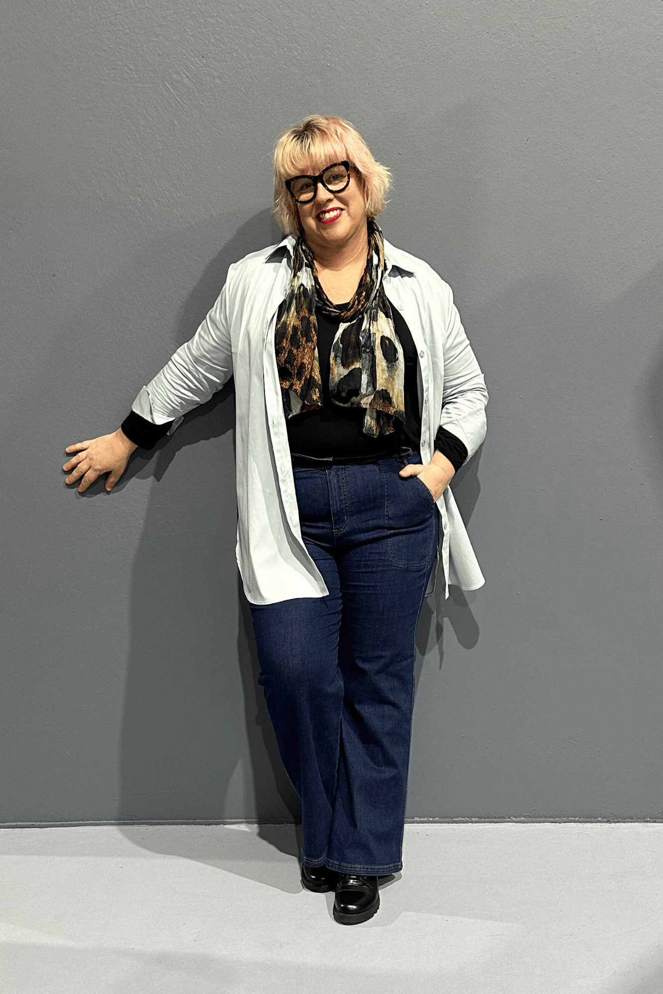 Versatile 'NOT HIS SHIRT' top, styled with 'STELLA' jeans and 'EMBRACE' skirt, perfect for plus size women.
