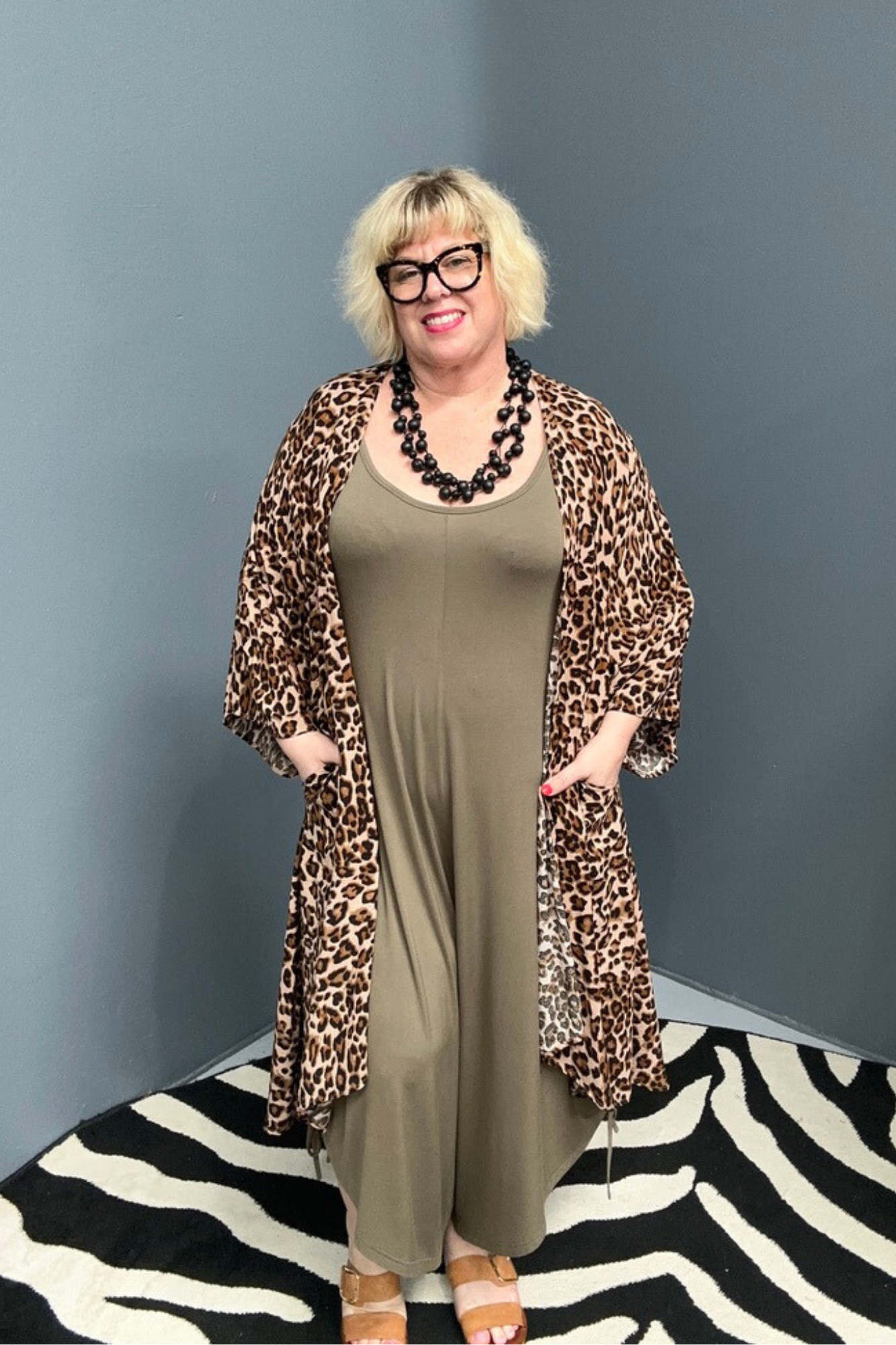 Plus-size khaki bamboo jumpsuit with a relaxed, flowy fit.
