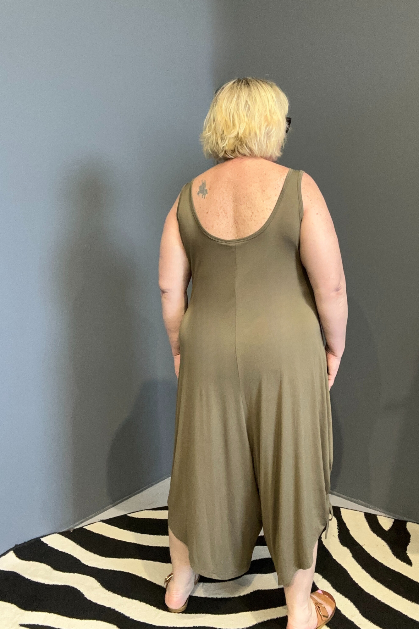 Plus-size khaki bamboo jumpsuit with a relaxed, flowy fit.