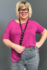 Plus-size vintage wash 7/8 slim jeans with stretch fit.